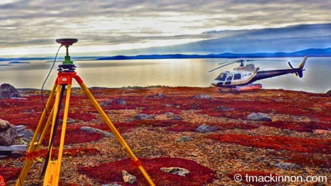 Leica GPS survey control base|RTK GPS base|Grey Jay in Labrador landing on the radio tripod|||||||||