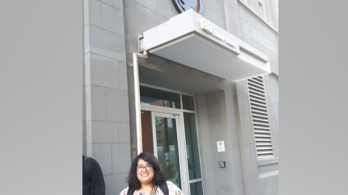 Murrium standing outside Github headquarters.|Murrium standing outside Github headquarters|Murrium's team mates sitting at a table. From left to right; Warren; Brian; Tia; Perry.|People waiting in line to start the Hackathon||FreeCodeCamp Hackathon competitors working on their projects|Gabriel Greenfield of the winning team|Gabriel Greenfield of the winning team