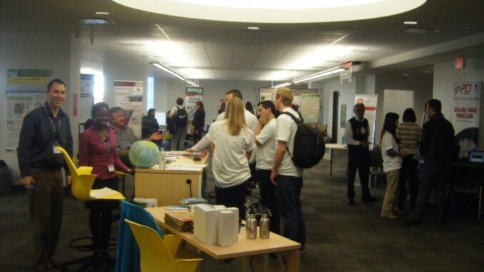 A great GIS Day Team in Ottawa|GIS Day Carelton 2013|Main Area GIS Day Ottawa|Having a great Day on GIS day in Canada|Map Games on GIS Day in Ottawa|NRCAN Surveying Branch|PCI Geomatics at GIS Day in Ottawa|RCMP GIS in Ottawa|RCMP Showing off skills in GIS and Crime|Scott Mitchell GIS Day Ottawa