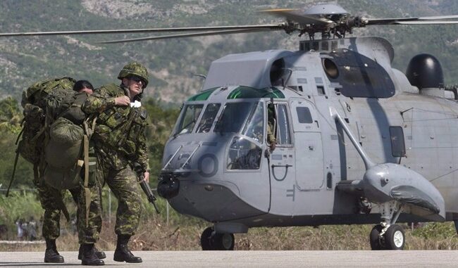 GEOINT Canada||Kandahar Airfield Afghanistan Neil Thompson|Neil Thompson with Canadian Military Geo Tech's in the field