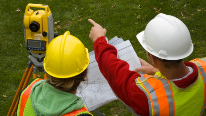 |MacKinnon setting up a Leica RTK GPS unit